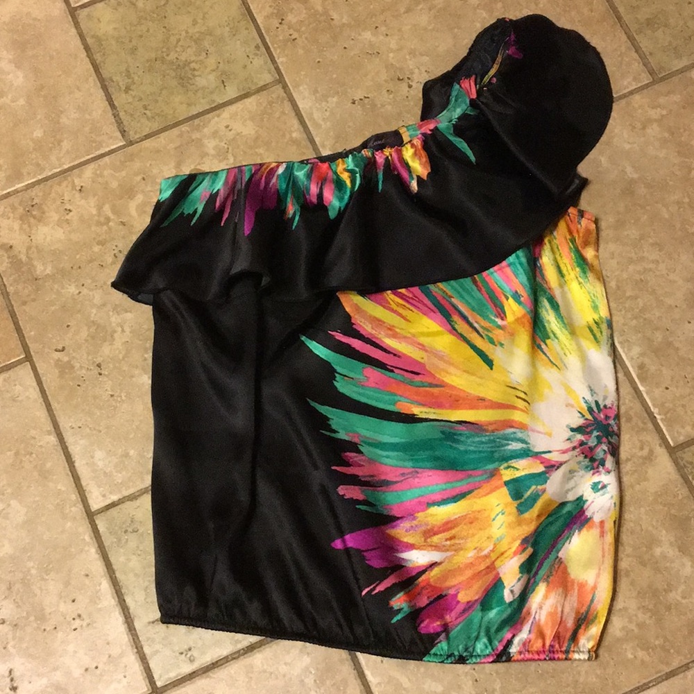 Women top, one shoulder.